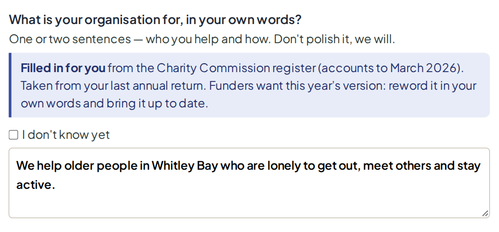 An answer box with a blue label: Filled in for you from the Charity Commission register. Funders want this year’s version: reword it in your own words and bring it up to date.
